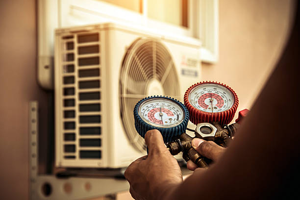 Professional Hvac technician working in Portland, MI